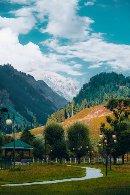 Mountain Landscapes - Picturesque scene of mountains, a gazebo, and wi #14434884