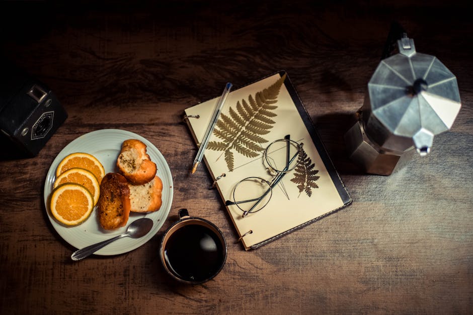Food Aesthetics - A warm breakfast setup with coffee, orange slice #14792337