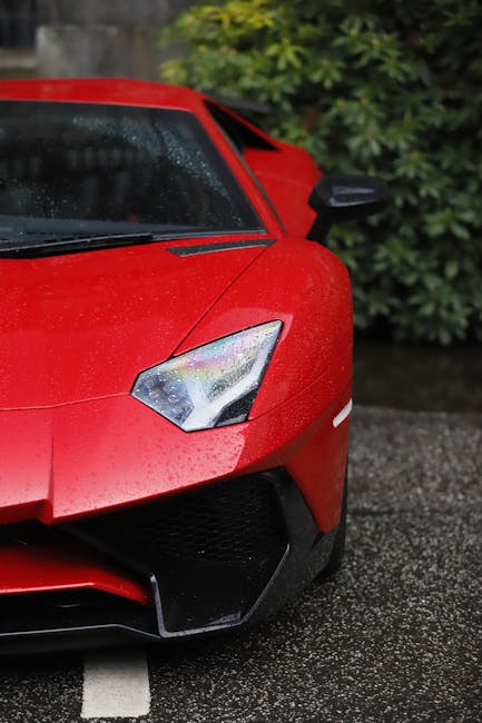 Luxury Cars - Captivating close-up of a luxury red sports car #16584993