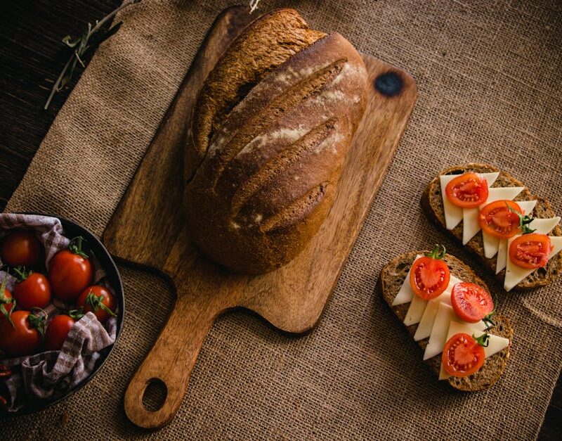 Food Aesthetics - Artisan bread on a cutting board with cheese and #30816585