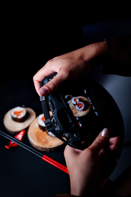 Food Aesthetics - Close-up of a photographer taking pictures of go #31286781