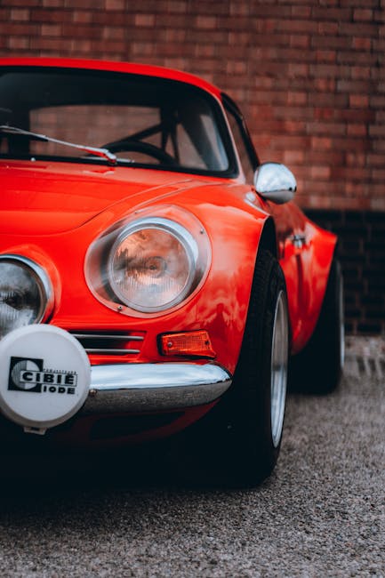 Luxury Cars - Detailed shot of a classic red vintage sports ca #33285089