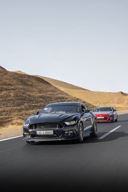 Luxury Cars - Two sports cars speeding on a desert highway, sh #33889817