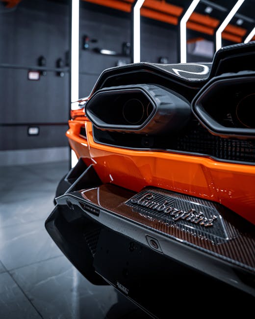 Luxury Cars - Detailed view of orange Lamborghini exhaust in a #34054738