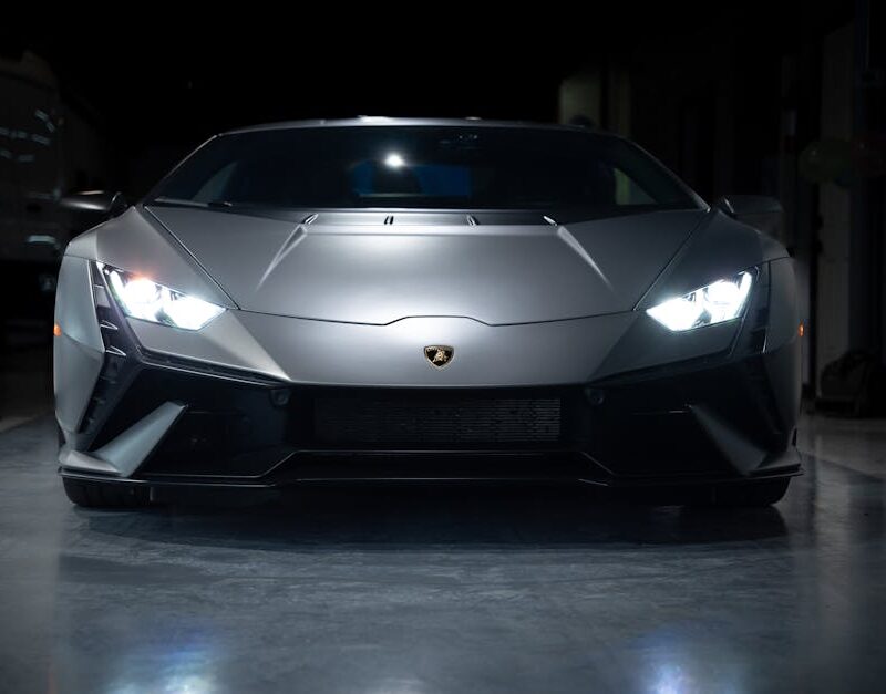 Luxury Cars - Front view of a silver sports car with headlight #35508367