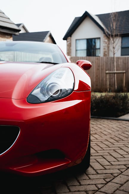 Luxury Cars - Close-up of a red sports car parked in a suburba #36597203