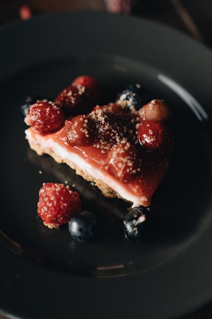 Food Aesthetics - Close-up of a berry cheesecake slice topped with #4051736