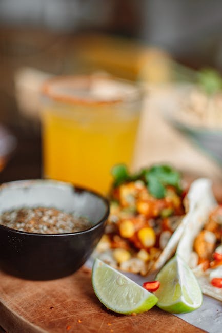 Food Aesthetics - Colorful Mexican tacos with fresh lime wedges an #4958653