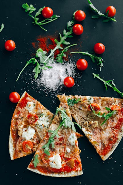 Food Aesthetics - Top view of gourmet pizza slices with arugula, c #5792329