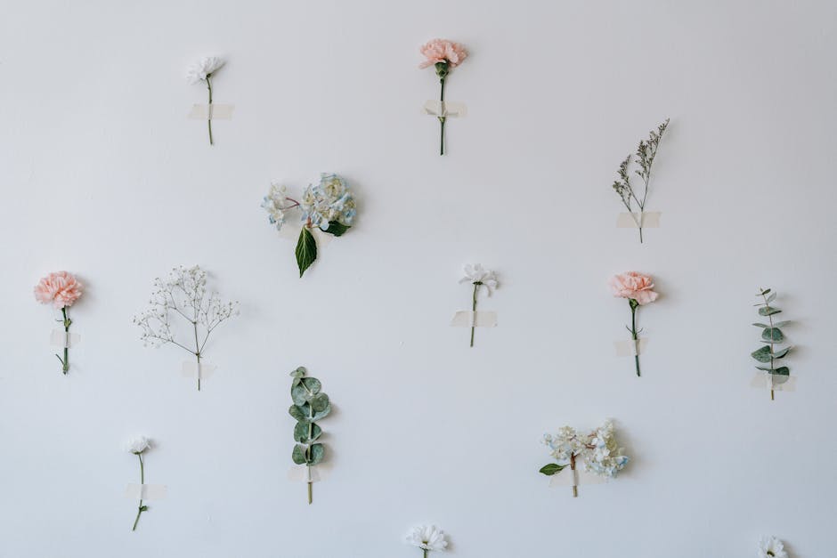 Flowers & Plants - White wall with thin twigs and colorful roses ne #6913768