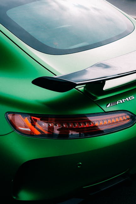 Luxury Cars - Detailed view of a green Mercedes Benz AMG car t #9793489